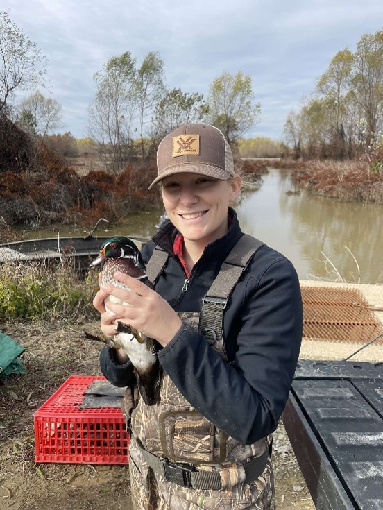 Lydia Holmes holding a duck