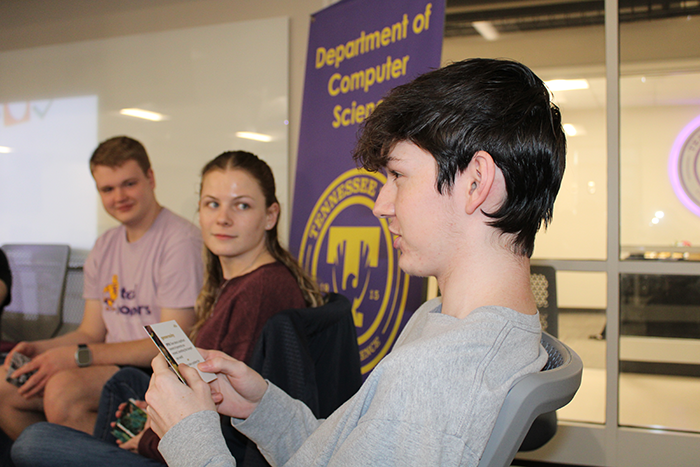 Three Computer Science students engage in a LEAD CS activity.