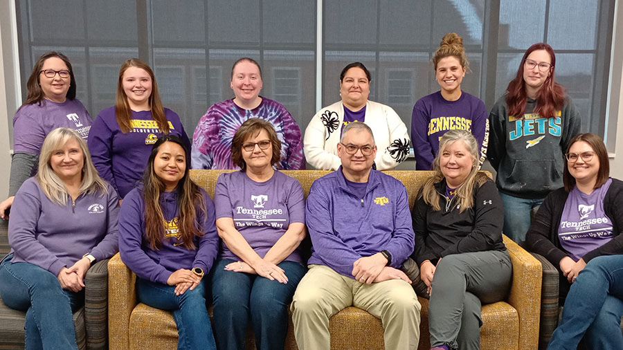 The Human Resources staff posing in front of Derryberry Hall