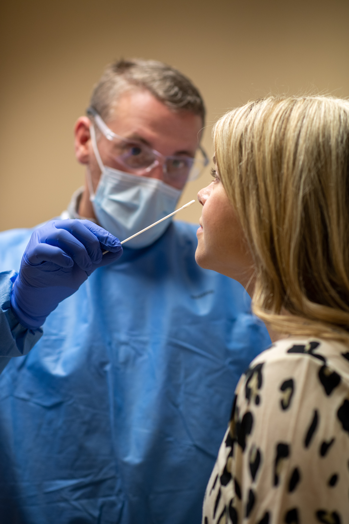 Robert Brady of Tennessee Tech Health Services administers a COVID-19 test to a patient on campus.