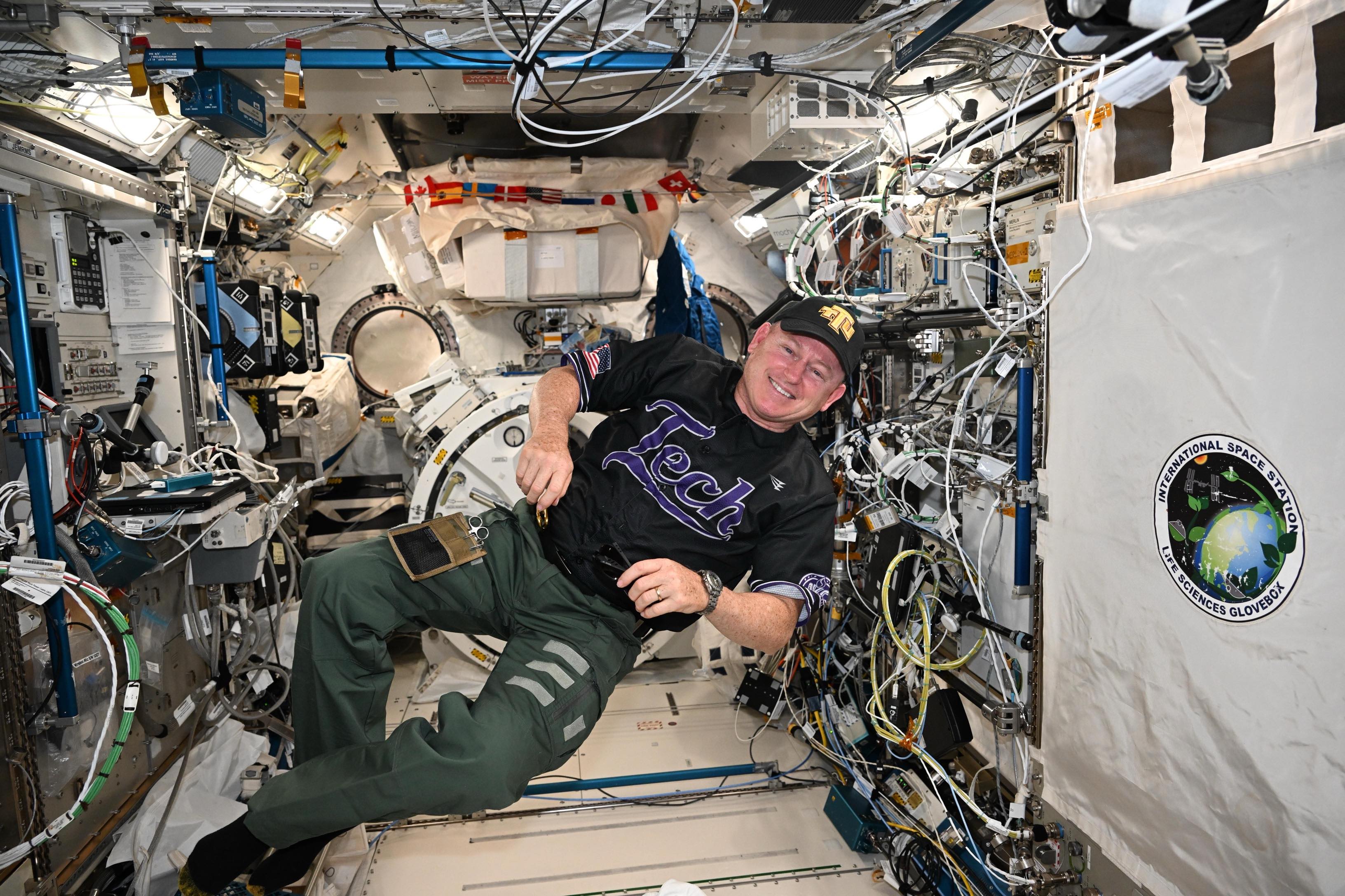 Tennessee Tech alumnus and trustee Barry “Butch” Wilmore dons a Tech jersey and hat during his stay on the International Space Station. Photo courtesy of NASA.