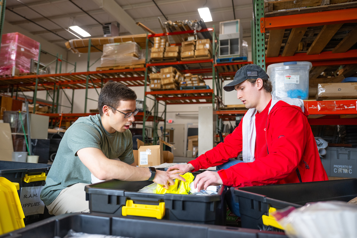 Sorting supplies for the Upper Cumberland RAM clinic set for March 16-17 are, left, Alexander Coker, event lead, and Ethan Levoy, hospitality lead.