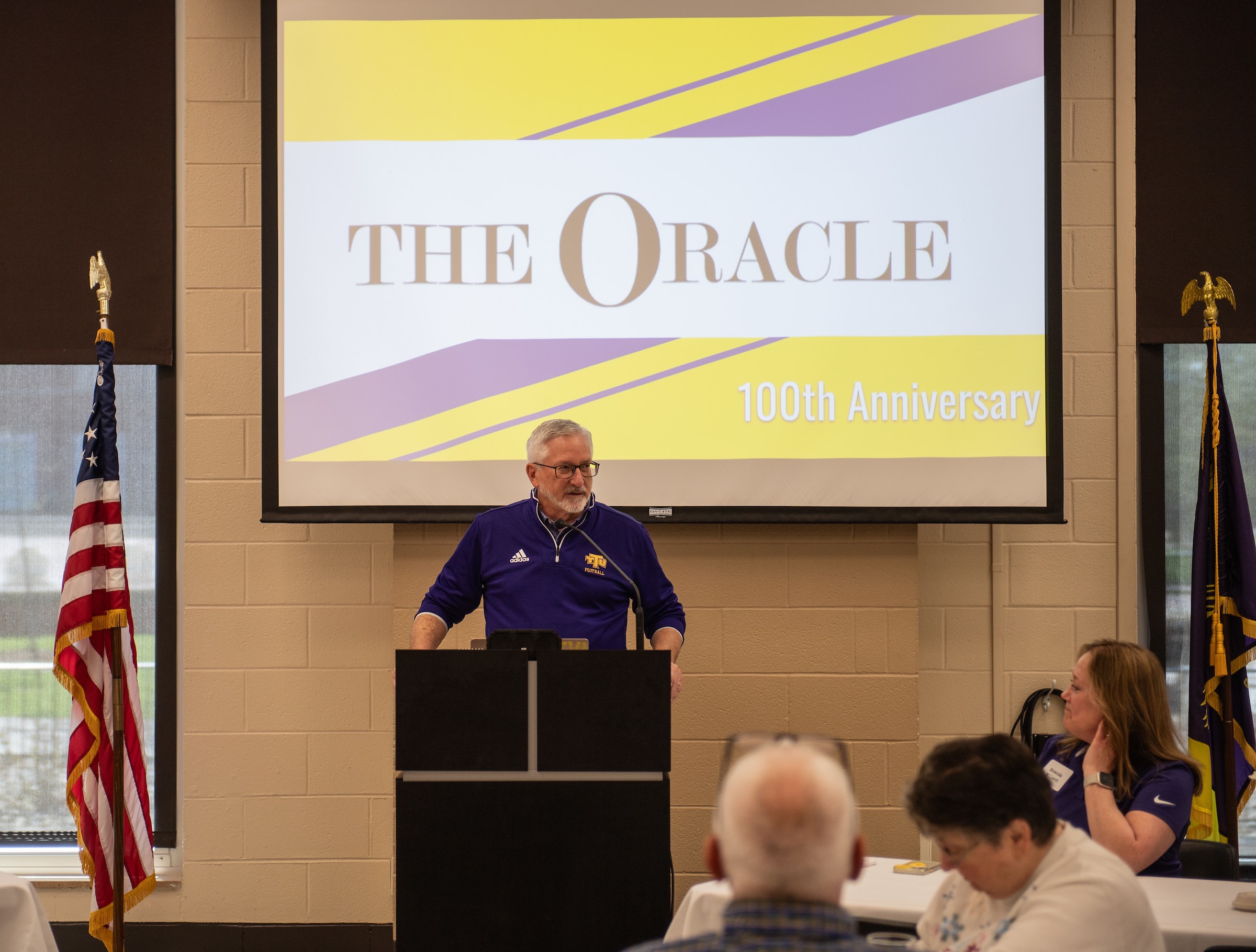 Tech President Phil Oldham delivers remarks at the reunion event.