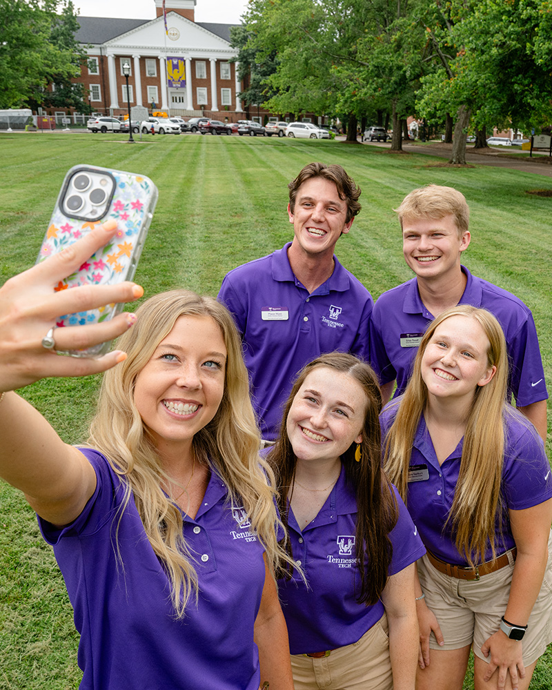 A group of SOAs posting for a selfie.