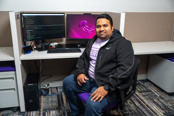 Mostaq Hossain at his desk in the Ashraf Islam Engineering Building