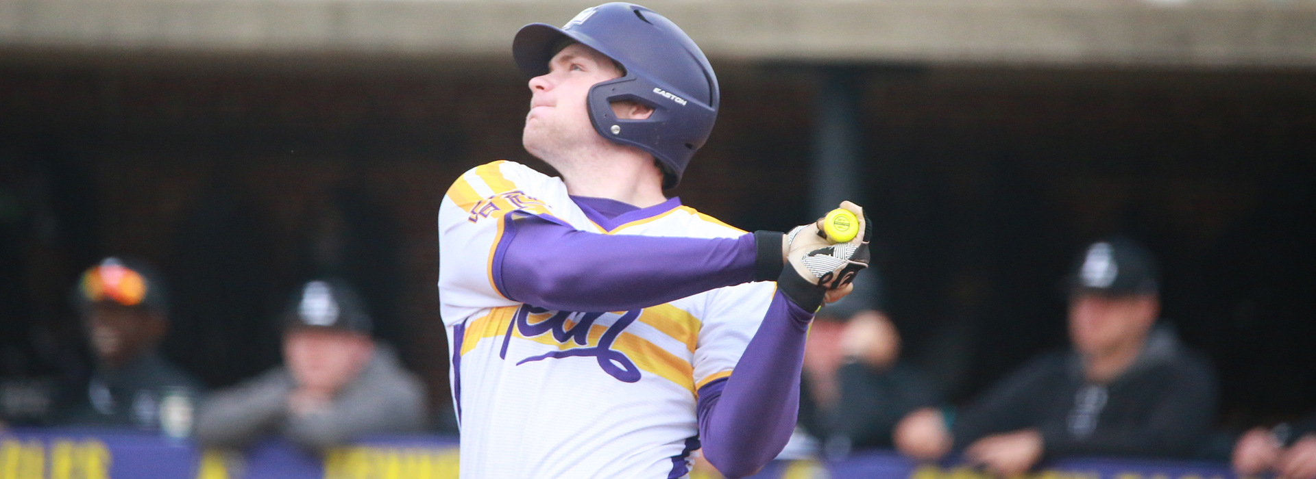 a Tech baseball player swings at a pitch