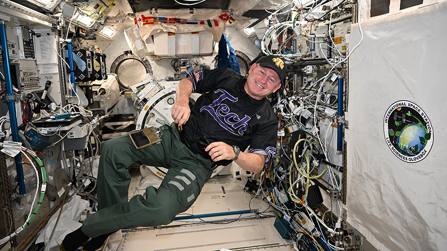 Barry Wilmore floating in the International Space Station.